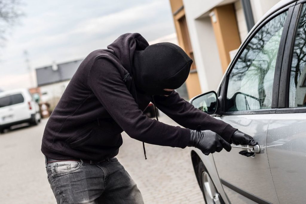 Person stealing a car