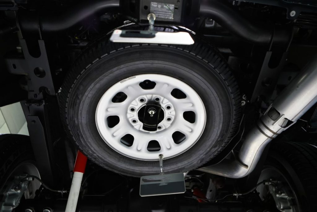 Spare tire location in a minivan